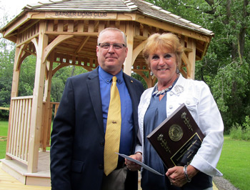 Carol Anders accepts her Uplinger Award